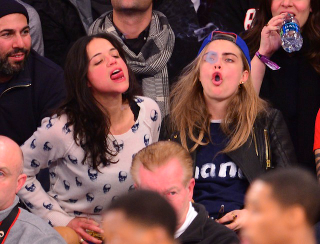 Illustration for article titled Michelle Rodriguez Got Drunk, Made Out With A Model At The Knicks Game